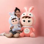 Stuffed doll with bunny cap