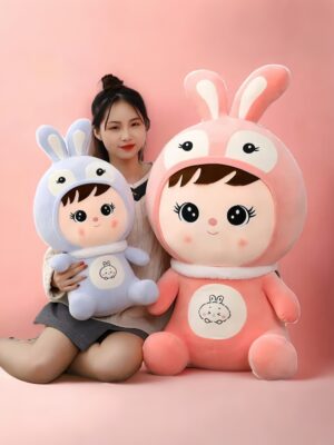 Stuffed doll with bunny cap